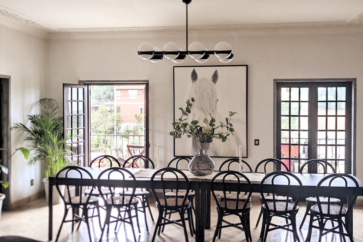 Dinning room with seating for 12,  leading to outdoor deck